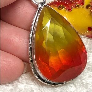 Orange and yellow bi color glass pendant